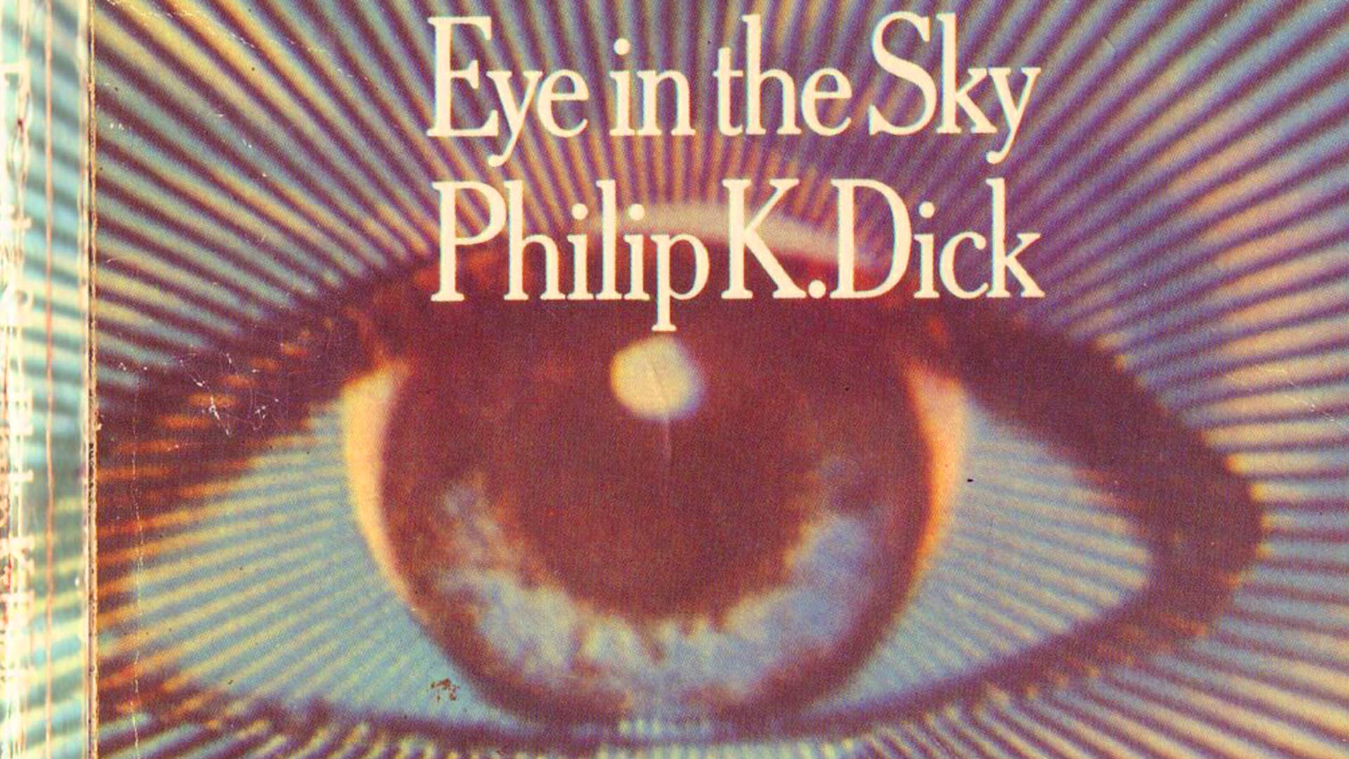 Paperback cover of Eye in the Sky by Philip K Dick - a giant eye with radiating lines