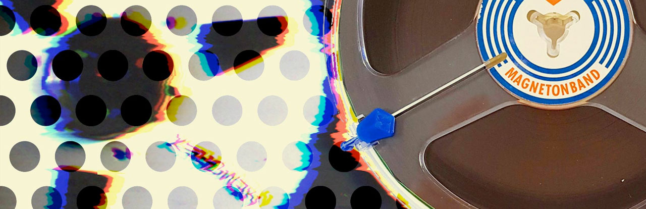 A glitched reel-to-reel tape spool with Magnetonband label against a polka dot background